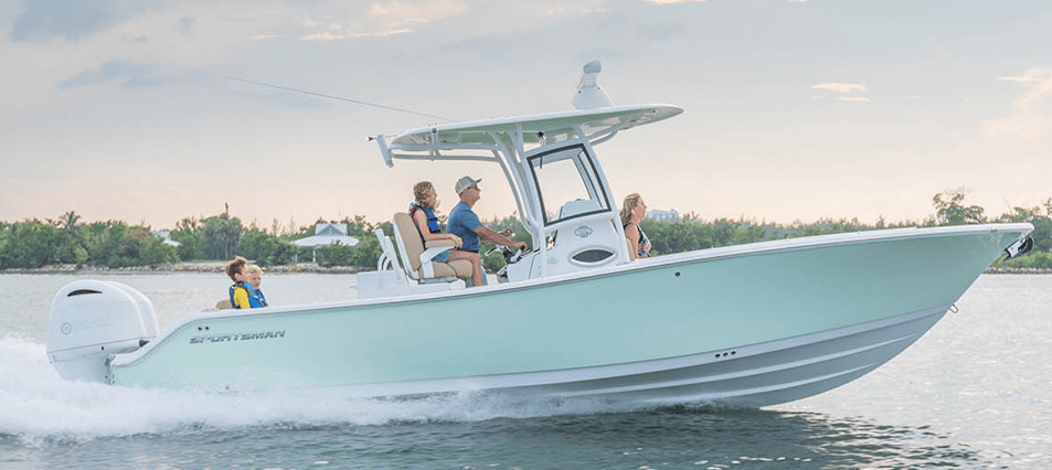 image of a center-console boat on the water with a family. those are some pros and cons of CC vessels.